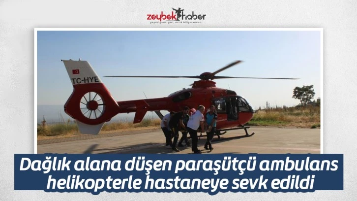 Dağlık alana düşen paraşütçü ambulans helikopterle hastaneye sevk edildi
